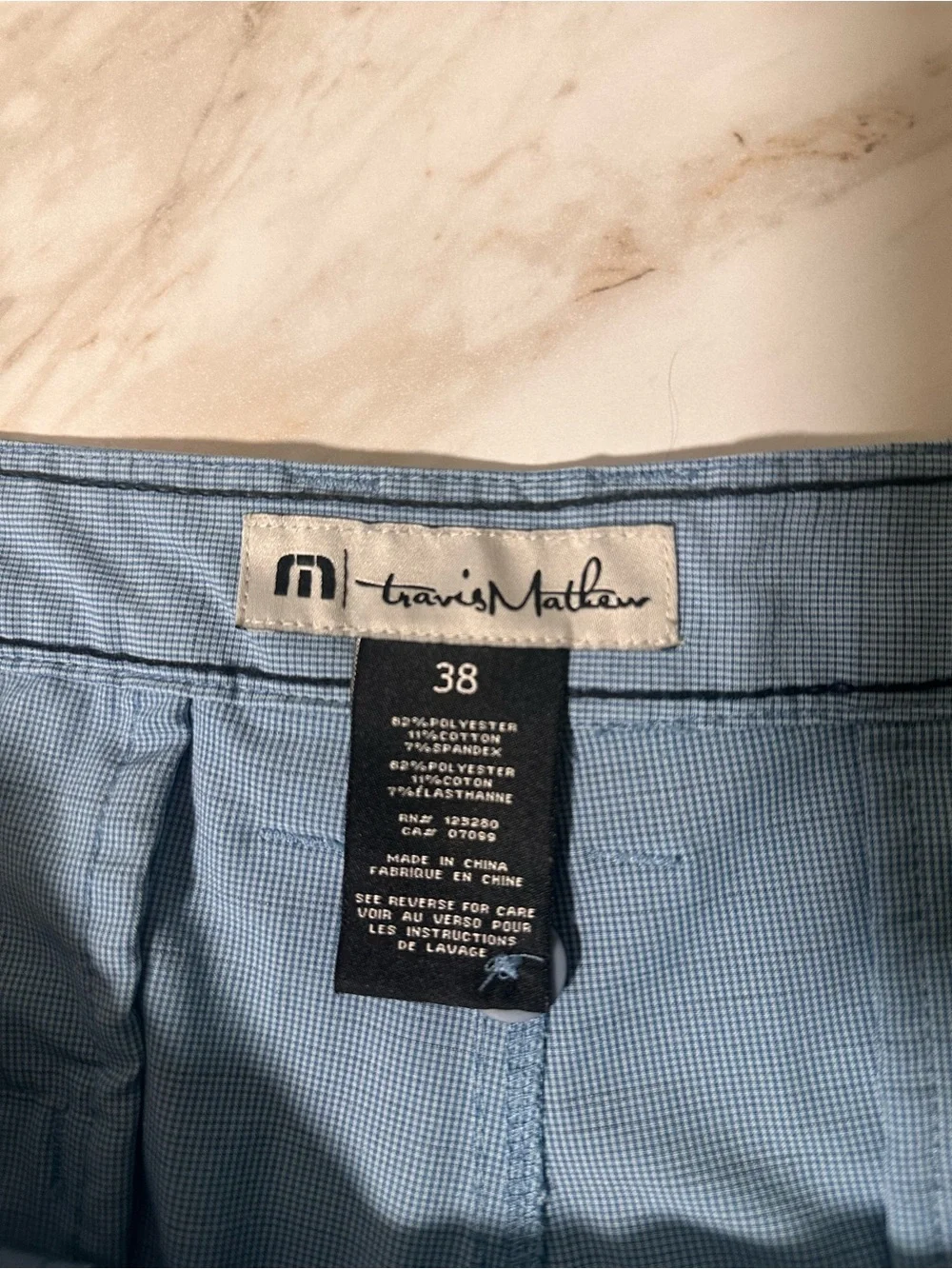 TravisMathew blue golf shorts size 38